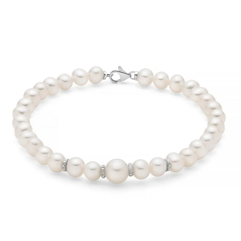 Bracciale Miluna di perle e diamanti, un gioiello di lusso che incarna eleganza e raffinatezza.