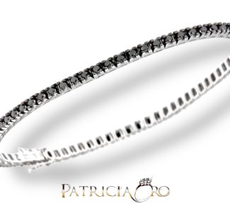 Bracciale tennis Davite&Delucchi con diamanti neri, un gioiello di lusso perfetto per chi cerca l'eleganza senza tempo. Scopri la nostra selezione di gioielli diamanti.