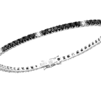 Splendido bracciale tennis con diamanti neri in oro 18 carati, un gioiello di lusso firmato Davite&Delucchi. Perfetto per chi cerca gioielli diamanti di alta gioielleria.