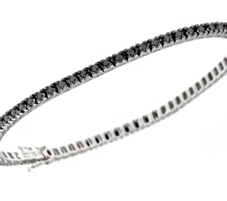Splendido bracciale tennis con diamanti neri in oro 18 carati, un gioiello di lusso firmato Davite&Delucchi. Perfetto per chi cerca gioielli diamanti unici e preziosi.
