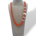 Splendida collana in corallo con perle barocche, un capolavoro di gioielli made in italy, perfetto per un'occasione speciale.