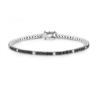 Bracciale tennis in oro bianco con zirconi, un gioiello di lusso perfetto per un'occasione speciale.