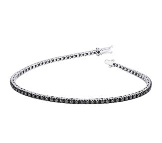 Bracciale tennis con zirconi neri in oro 18k, un gioiello di lusso perfetto per un'occasione speciale.