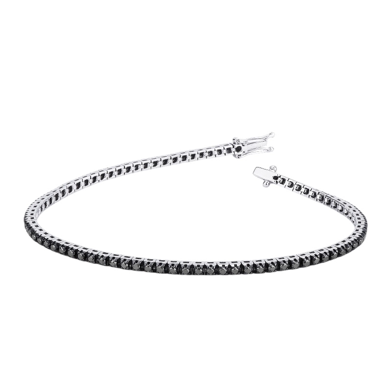Bracciale tennis con zirconi neri in oro 18k, un gioiello di lusso perfetto per un'occasione speciale.