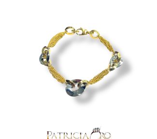 Bracciale da donna in oro bicolore, un gioiello di lusso perfetto per un'idea regalo preziosa.