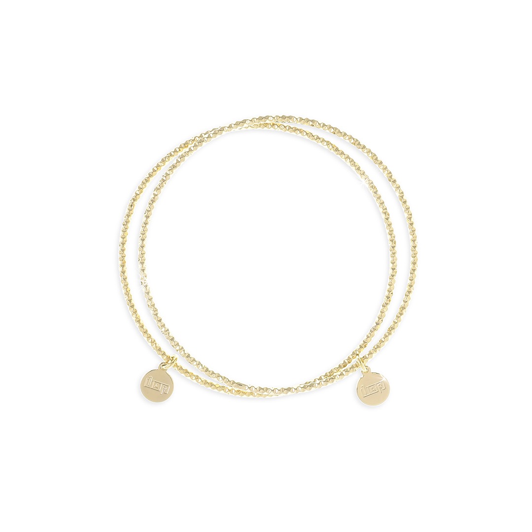 Scopri l'eleganza senza tempo del Bracciale Rigido UnoAerre, un gioiello di lusso che incarna la raffinatezza dell'alta gioielleria.