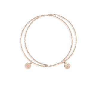 Scopri l'eleganza senza tempo del Bracciale Rigido UnoAerre, un gioiello di lusso che incarna la raffinatezza dell'alta gioielleria.