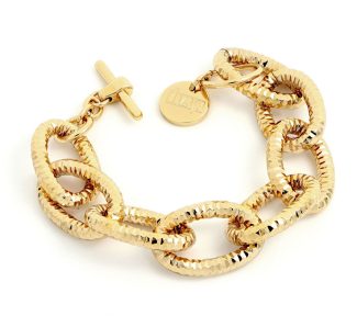 Bracciale UnoAerre dorato: un gioiello di lusso per un'eleganza senza tempo.