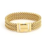Bracciale UnoAerre dorato: un gioiello di lusso per un'eleganza senza tempo.