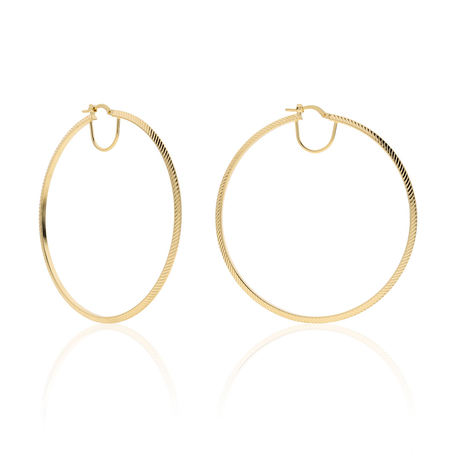 Orecchini a cerchio UnoAerre, gioielli di lusso per un'eleganza senza tempo.