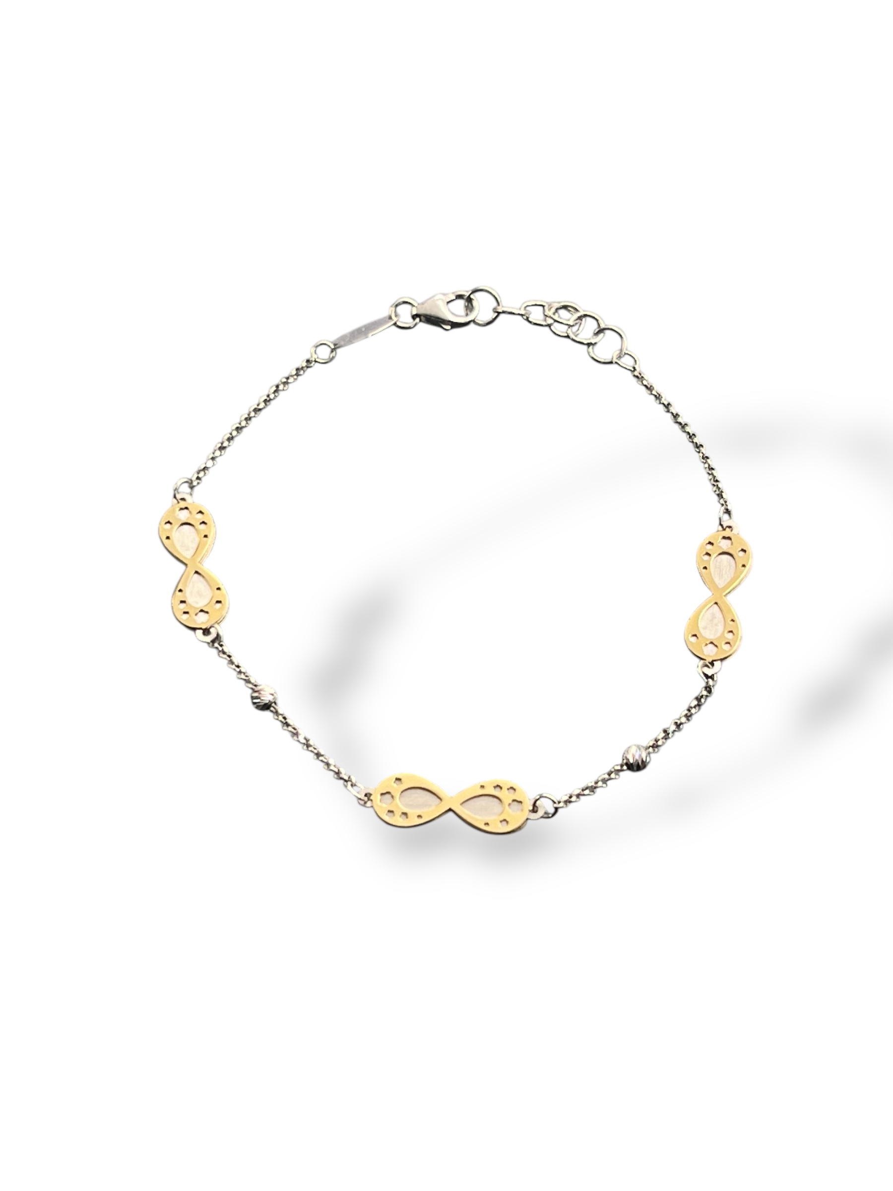 Bracciale Infinito Donna in Oro, un gioiello di lusso perfetto per un'idea regalo preziosa.