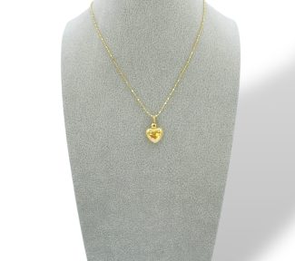 Collana con ciondolo a forma di cuore in oro, un gioiello di lusso perfetto come idea regalo preziosa.
