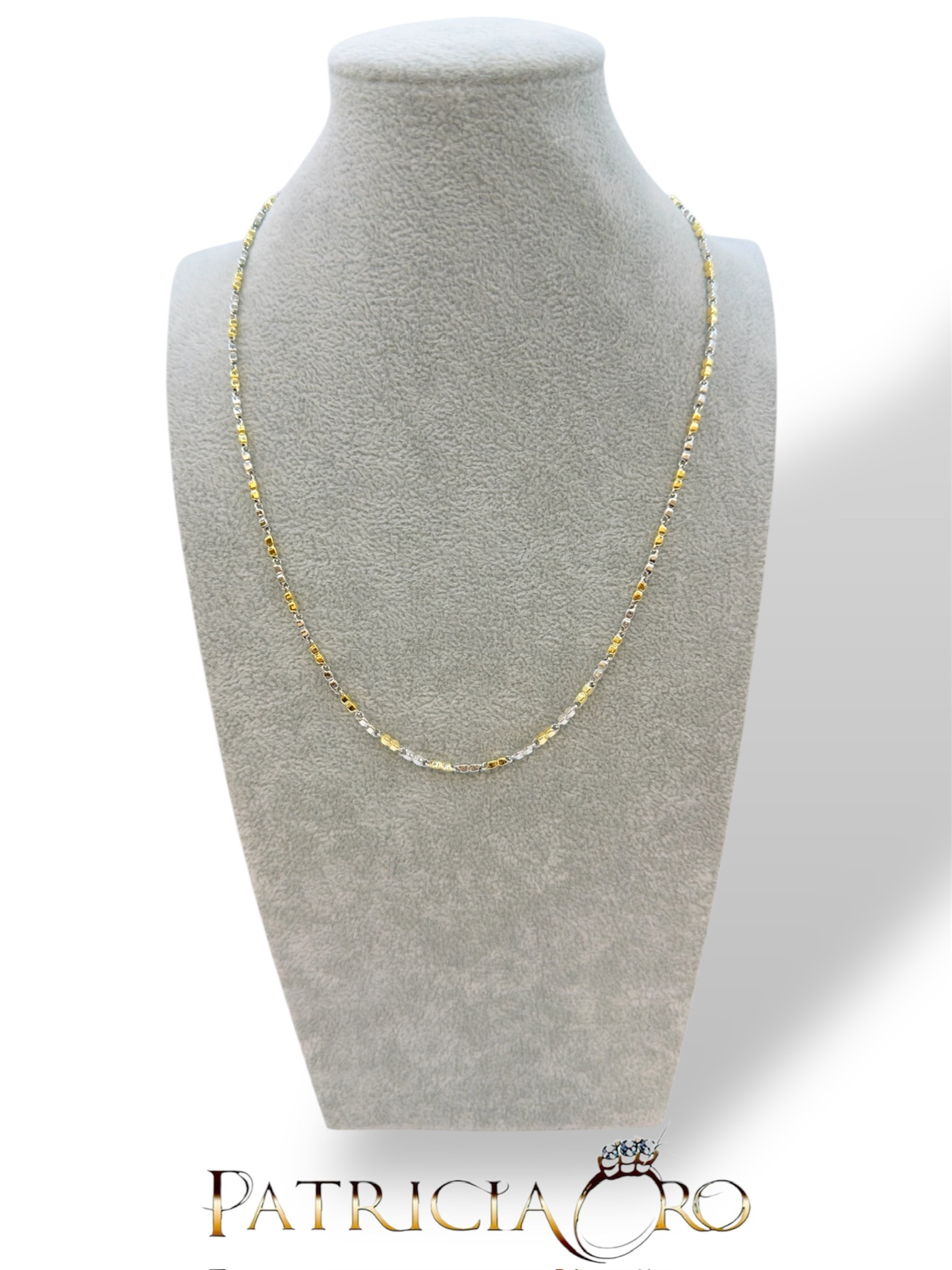 Girocollo in oro bicolore da uomo, un gioiello di lusso perfetto per un regalo prezioso.