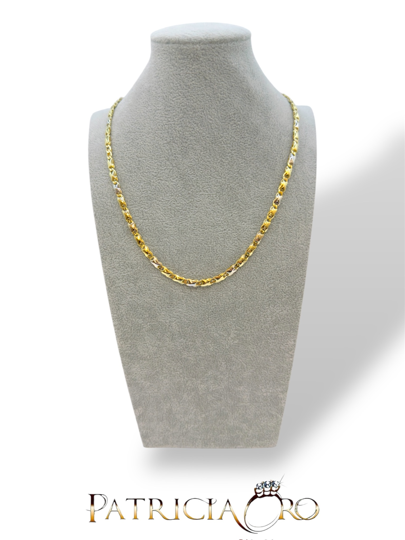 Girocollo da uomo in oro bicolore, un gioiello di lusso perfetto per un regalo prezioso.