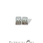 Eleganti orecchini clips in oro bianco, un gioiello di lusso perfetto per un'occasione speciale.