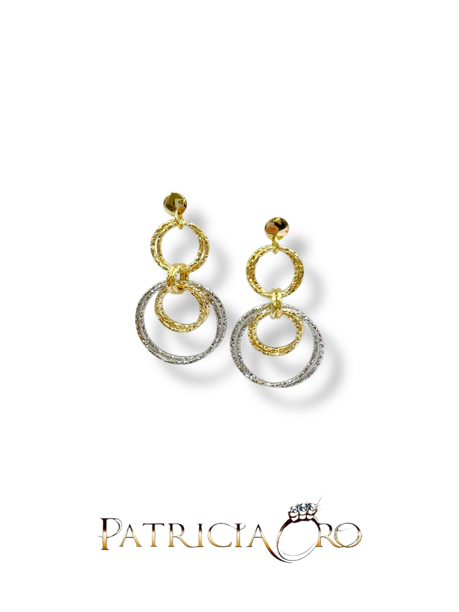 Eleganti orecchini pendenti bicolore, un gioiello di lusso perfetto per un'occasione speciale.