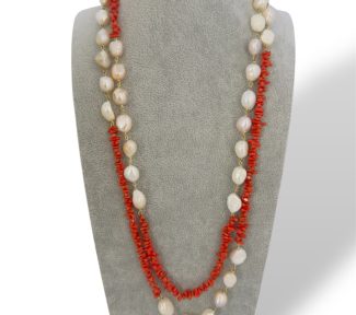 Splendida collana Corallo e Perle Barocche, un capolavoro di gioielli made in italy, perfetto per un'occasione speciale.
