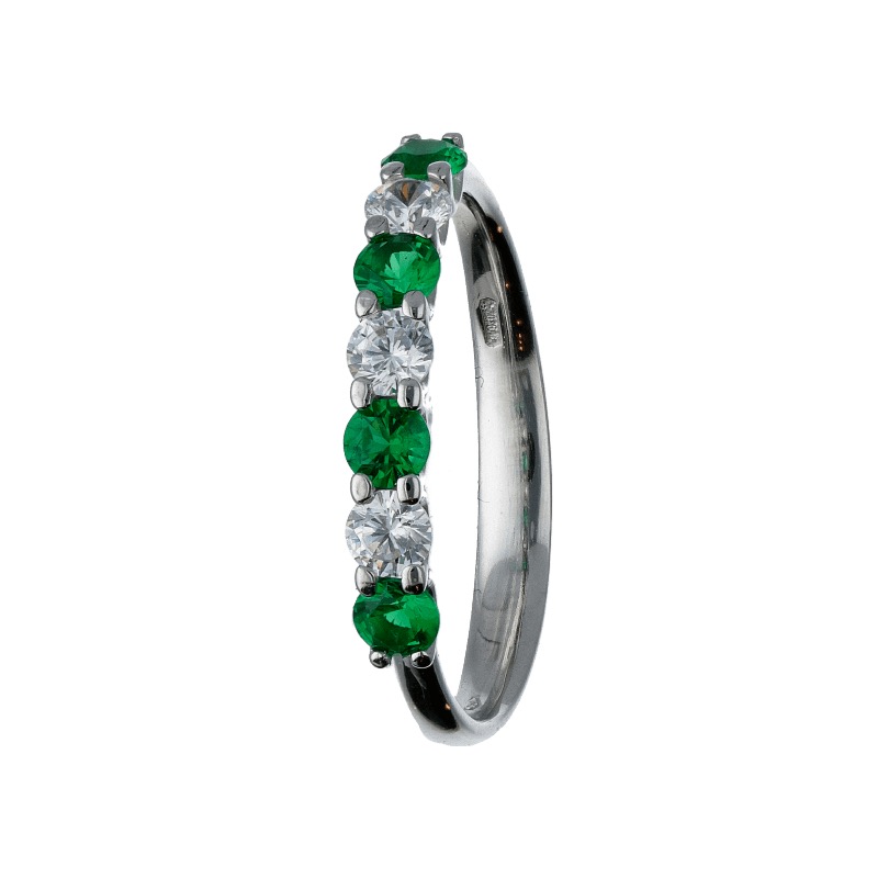 Anello Veretta in oro bianco con zirconi verdi, un gioiello di lusso perfetto per un regalo prezioso.