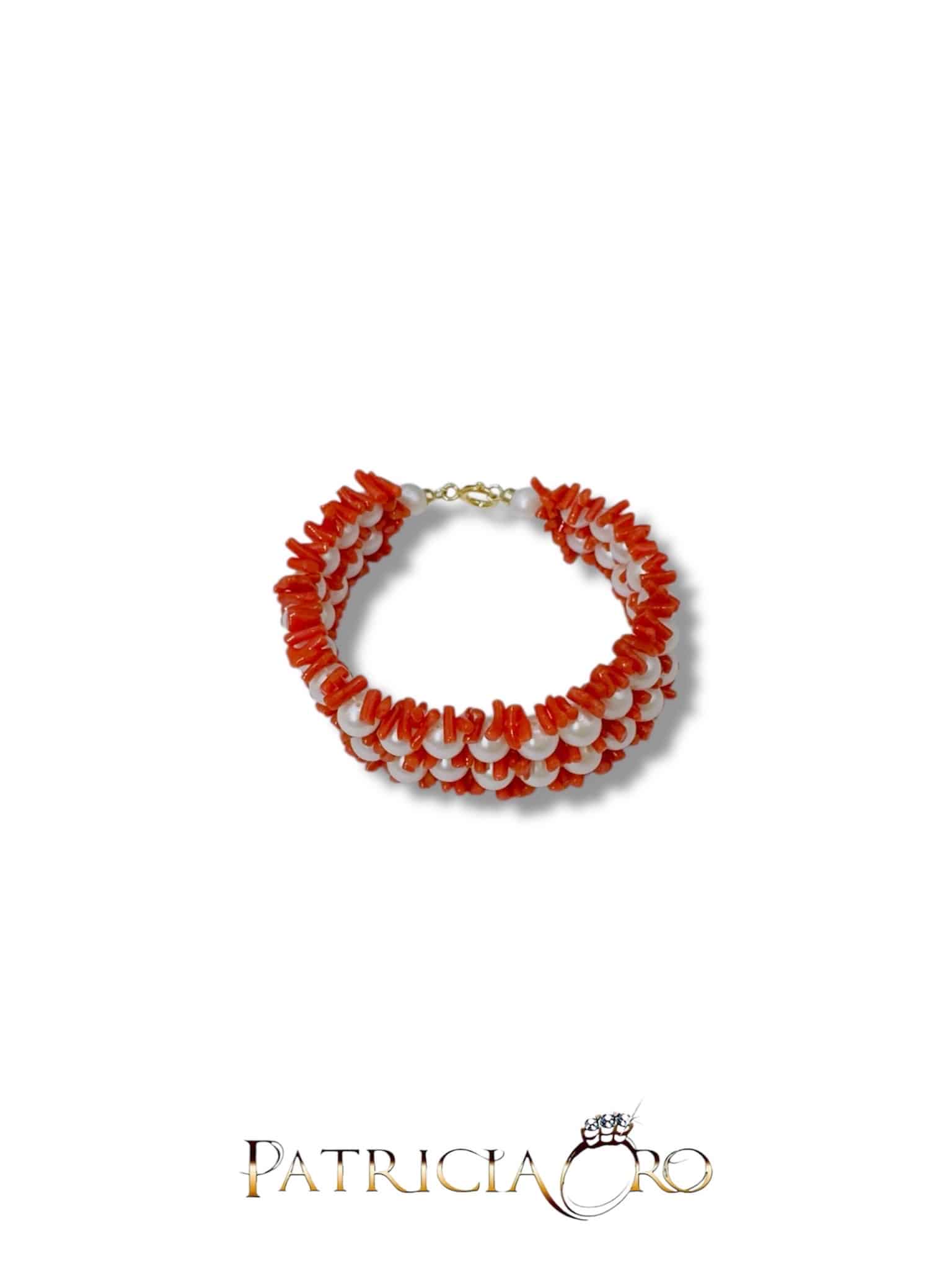 Splendido bracciale da donna con corallo naturale e perle preziose, un gioiello made in italy di Patricia Oro Creations, perfetto per un regalo di lusso.