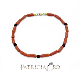 Bracciale da uomo Patricia Oro Creations in oro 18kt con Corallo Sciacca e onice: un gioiello made in italy di alta gioielleria.