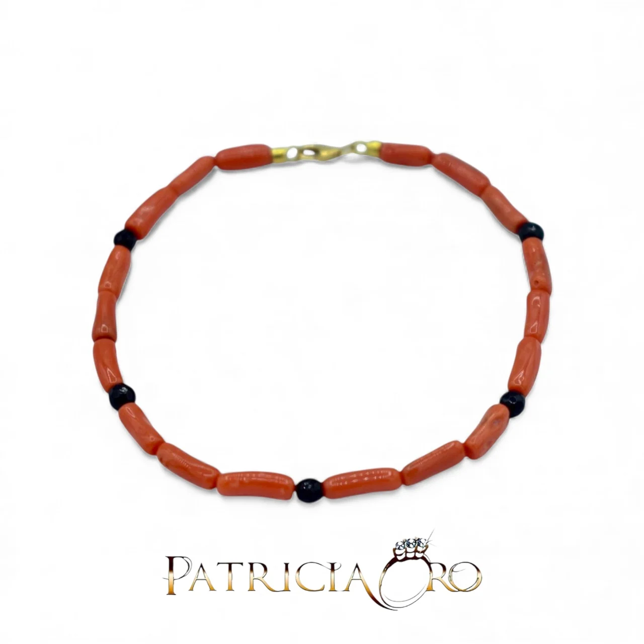 Bracciale da uomo Patricia Oro Creations in oro 18kt con Corallo Sciacca e onice: un gioiello made in italy di alta gioielleria.