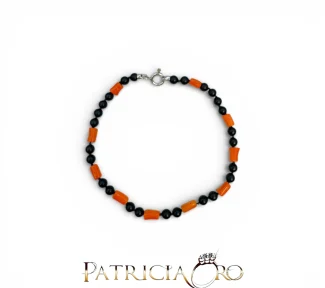 Bracciale da uomo Patricia Oro Creations con Corallo Sciacca e Onice: un gioiello di alta manifattura italiana, perfetto come idea regalo preziosa.