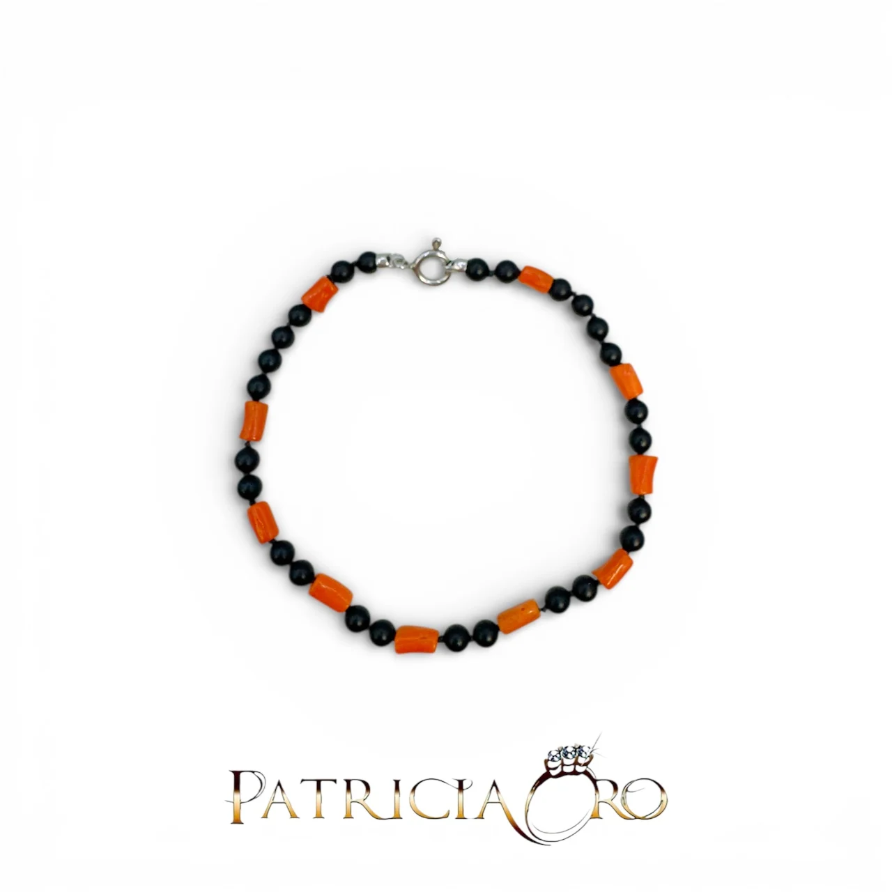 Bracciale Uomo Corallo Sciacca e Onice | Gioielleria Patricia Oro Bracciale da uomo Patricia Oro Creations con Corallo Sciacca e Onice: un gioiello di alta manifattura italiana, perfetto come idea regalo preziosa.