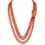 Collana da donna con Corallo Sciacca: una scultura di Patricia Oro Creations, un esempio di gioielli made in italy e alta gioielleria.